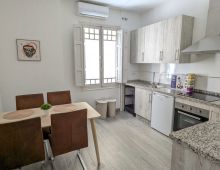 Sala de estar, descanso, cocina - Flatroomers Coworking  Coworking Córdoba Flatroomers Coworking